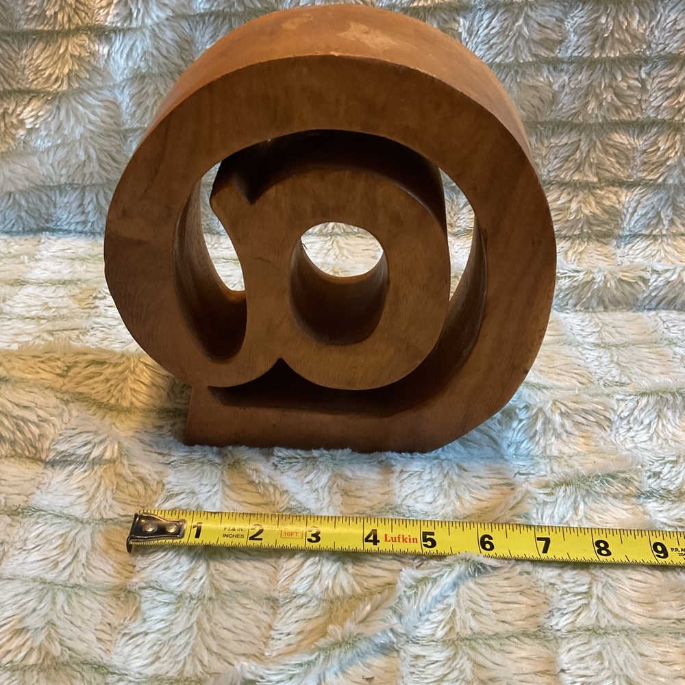 Wooden At Symbol Sculpture